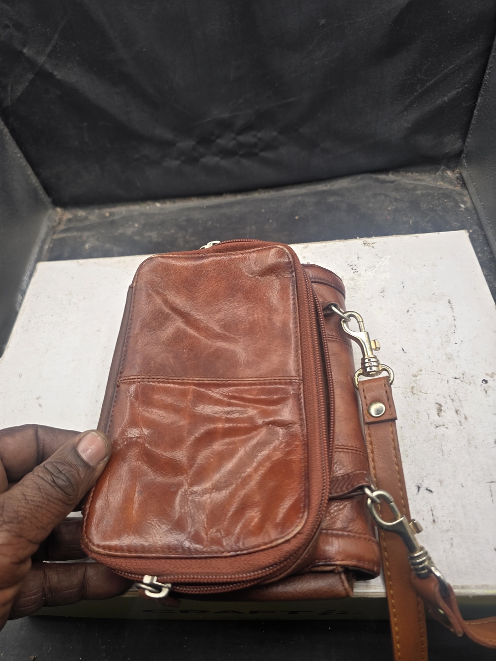 Compact Brown Leather Cosmetic Pouch with Detachable Strap